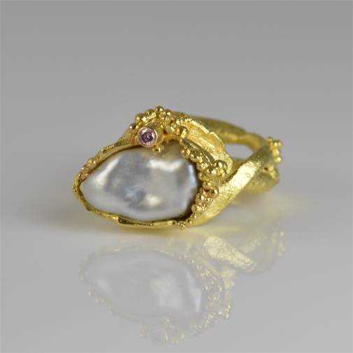 One of a kind 18k gold ring with pink diamond and South Sea ppearl by Susanne Lanng. Designer and jeweler in Skagen