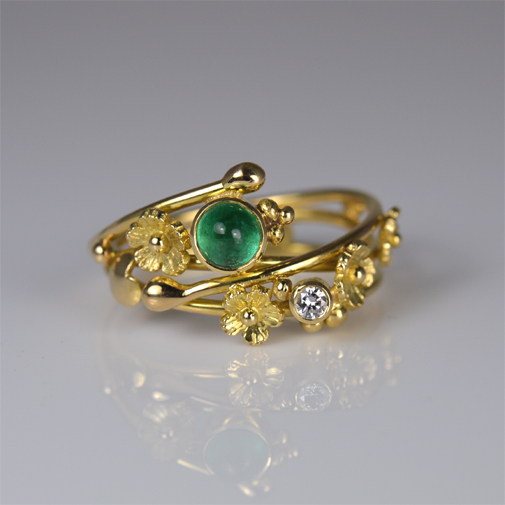 Handcrafted ring in 18k gold with emerald and diamond by Susanne Lanng. Danish designer and jeweler in Skagen.